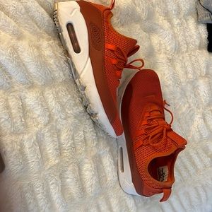Woman size 8.5 Nike Orange Air Max